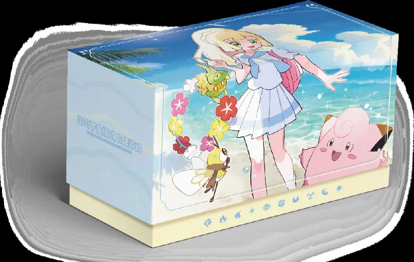 Close-up of the Lillie Battle Set Gift Box showing the beach scene artwork from different angles.